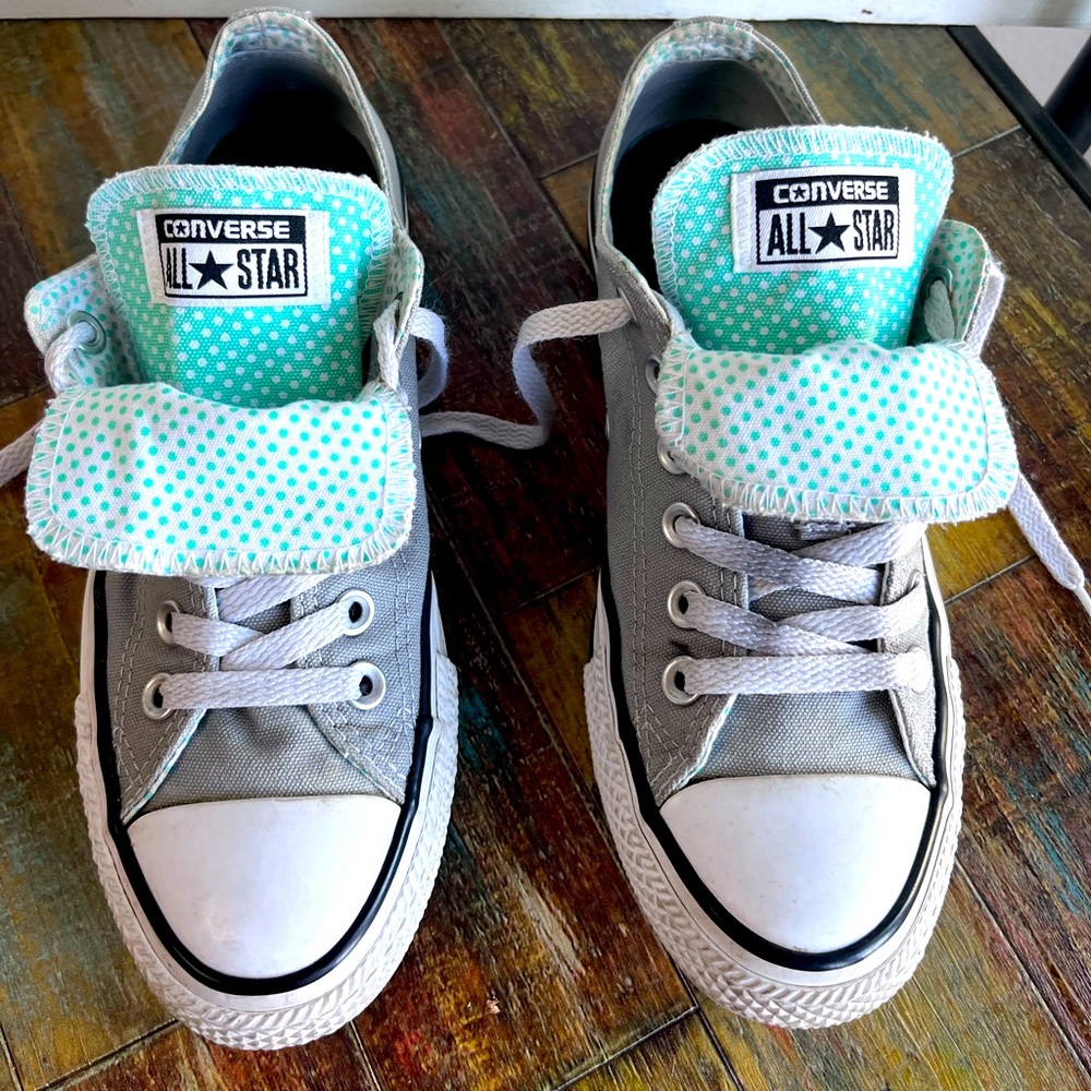 Converse women low top sneakers size 7, gray base with green tongue, and green